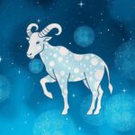 Taurus zodiac symbol surrounded by stars and constellations in a soothing blue and silver colour scheme.